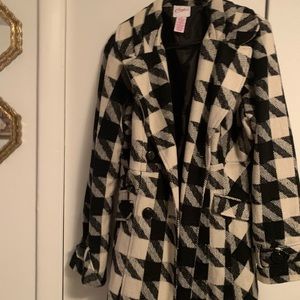 Candie’s black and white houndstooth coat